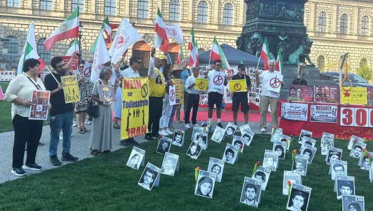 PMOI supporters gather in Munich for a rally and photo exhibition commemorating Iran’s 1988 massacre.