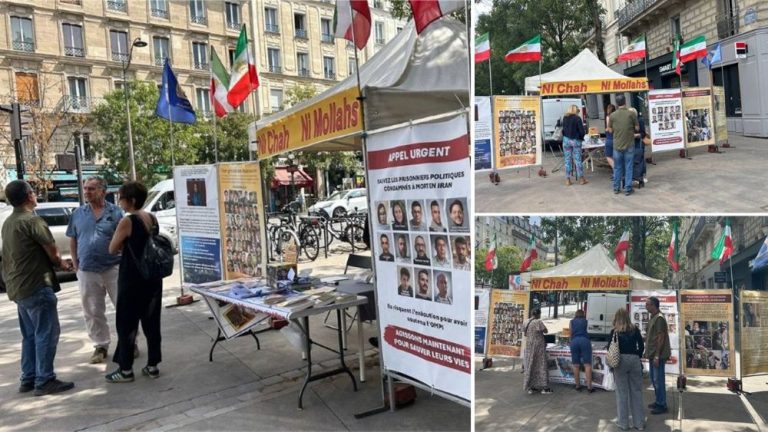 Book table and photo exhibition in Paris highlighting Ian’s executions and human rights violations.
