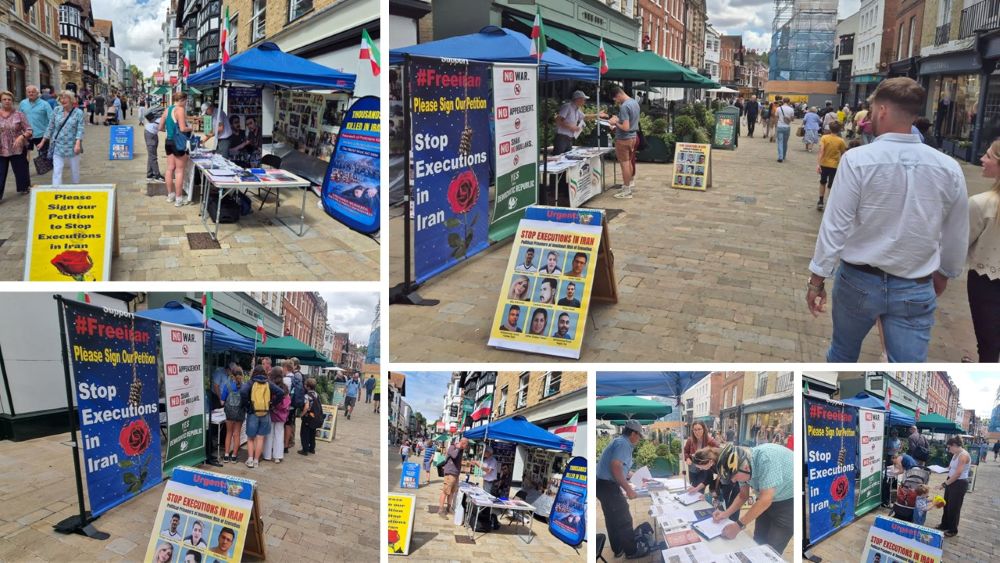 Book table and photo exhibition in Winchester highlighting Iran’s executions and human rights violations.