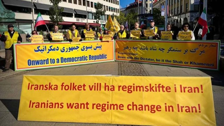 PMOI supporters rally in Gothenburg against executions, marking the September 27, 1981 uprising.