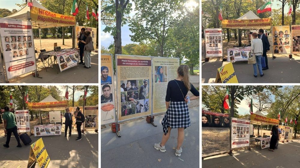 PMOI supporters at a book table and photo exhibition, Place des Invalides, Paris, September 29, 2026.
