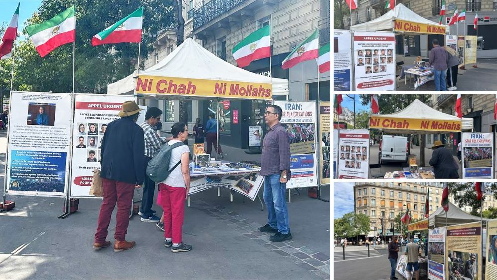 PMOI supporters hold a book table and photo display in Paris on September 2 2026