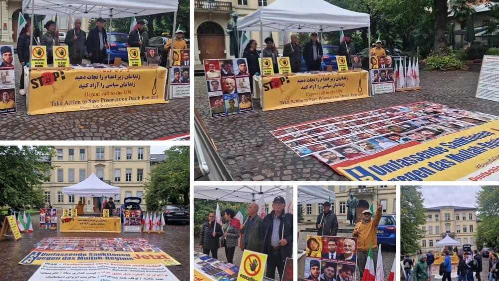 PMOI supporters stage a book table and photo exhibition in Heidelberg to protest executions in Iran.