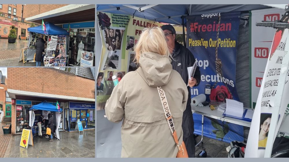 Academics in Exile and NCRI supporters call for an end to executions in Iran at a book table and photo exhibition in New Milton, UK.