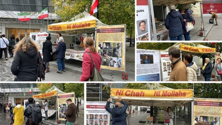 PMOI supporters in Paris braved rain and strong winds to expose Iran’s executions and demand a democratic republic.
