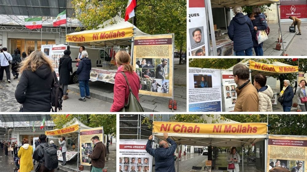 PMOI supporters in Paris braved rain and strong winds to expose Iran’s executions and demand a democratic republic.