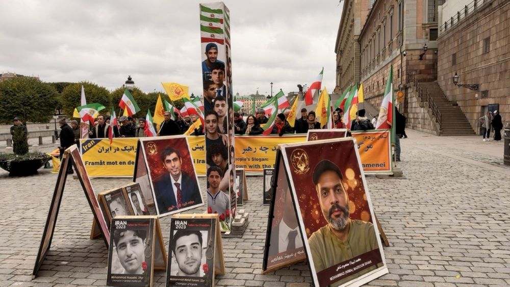 PMOI supporters rally outside the Swedish Parliament, calling for an end to executions and the release of political prisoners in Iran.